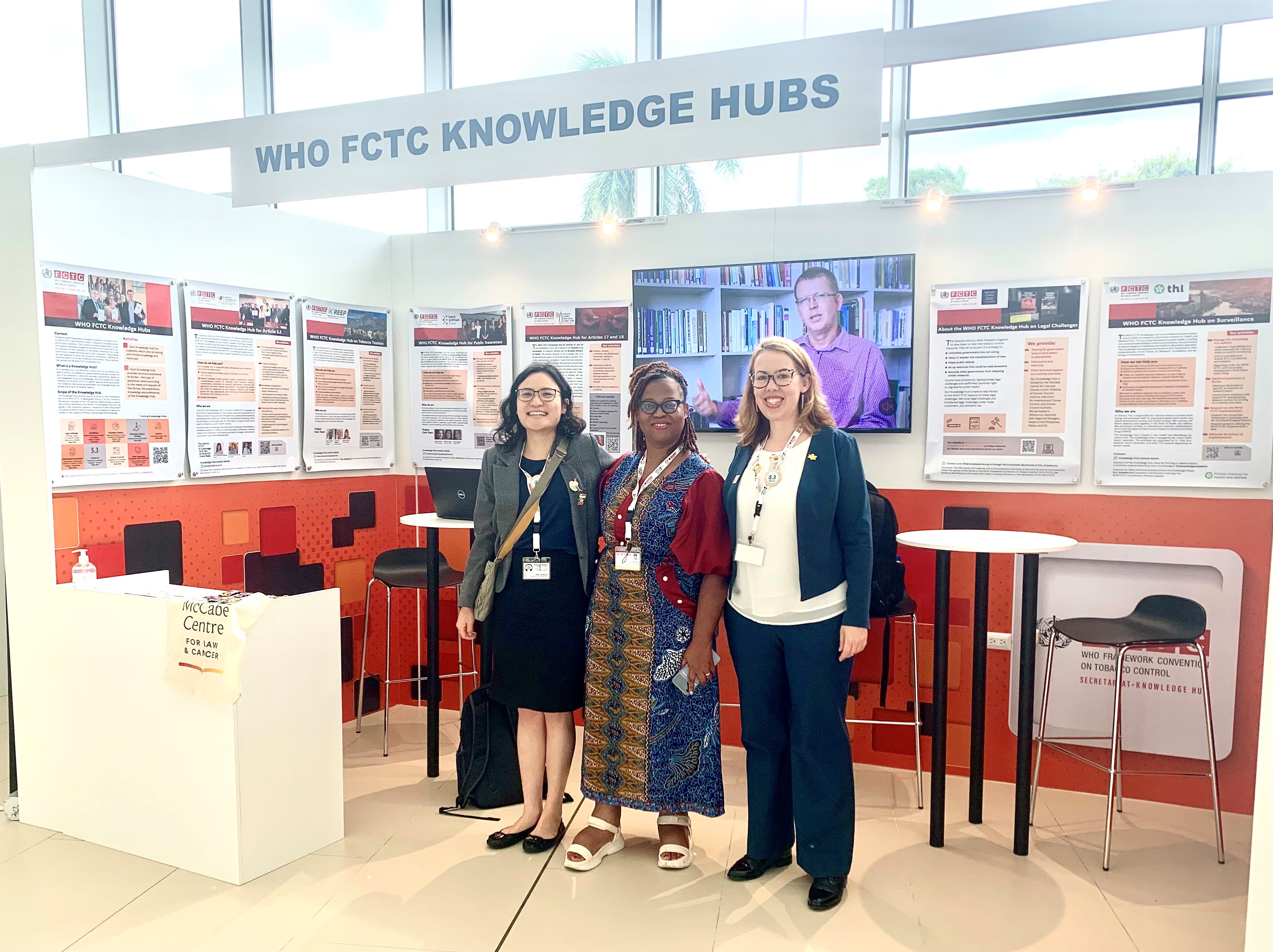 The Knowledge Hub on Legal Challenges team at the Knowledge Hub booth at COP11 Panama City