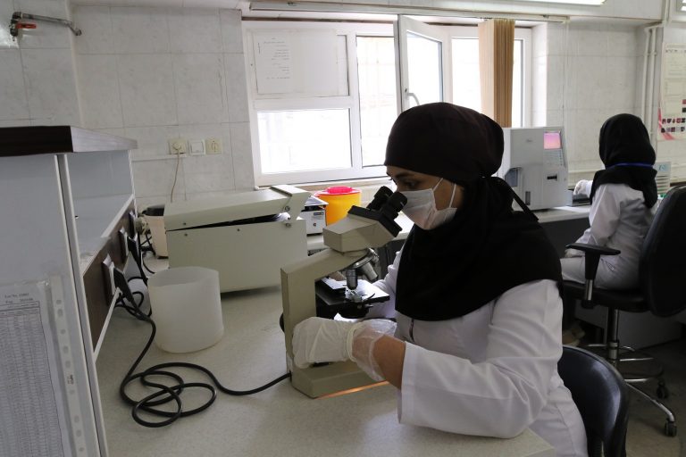 Lab technicians working at Zanjan Urban Comprehensive Health Centre, Zanjan Province, Islamic Republic of Iran. April 2020.