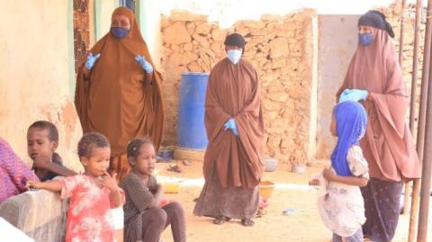 Beelo Botan, a health worker, along with her community rapid response team, visits households in Galkacyo as part of their work to support the COVID-19 response in Somalia.