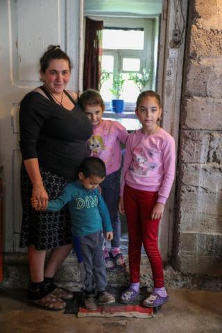 Ketevan Ioseliani, expecting mother and her children meeting the representatives of UNICEF in village Nikozi, Gori Municipality, Georgia.