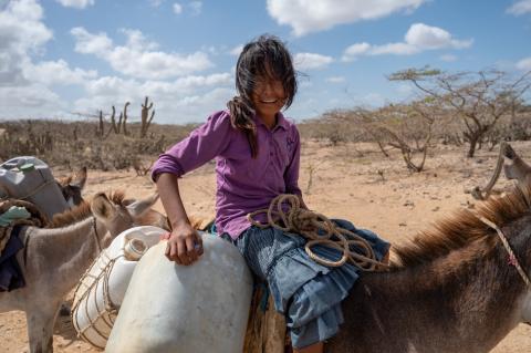 A young Wayúu lady collects water to take to her community. Photo taken in July 2020.