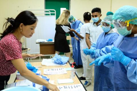 Timorese health workers undergoing training on how to use PPE facilitated by WHO and other health development partners.