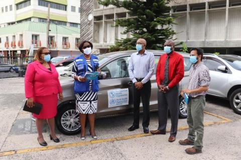 27 July 2020. PAHO/WHO ECC Office presented Dominica with a vehicle to support its COVID-19 surveillance program. Country Programme Specialist Anneke Wilson handed over the keys to Minister of Health, Wellness and New Investment, Dr Irving McIntyre